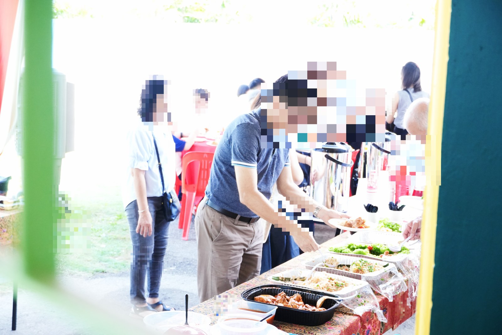 Outdoor catering set up for a gathering on the grounds